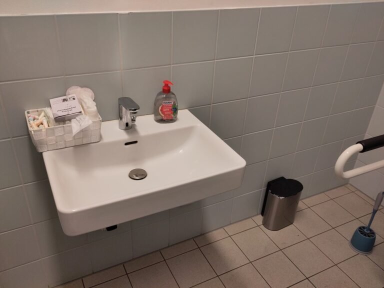 Menstrual hygiene products in an accessible bathroom of a school in Berlin, Germany